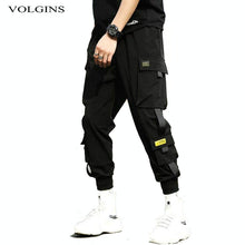 Load image into Gallery viewer, Streetwear Hip Hop negro Harem pantalones hombres cintura elástica Punk pantalones con cintas Casual Slim Jogger pantalones de hombres pantalones de Hip Hop
